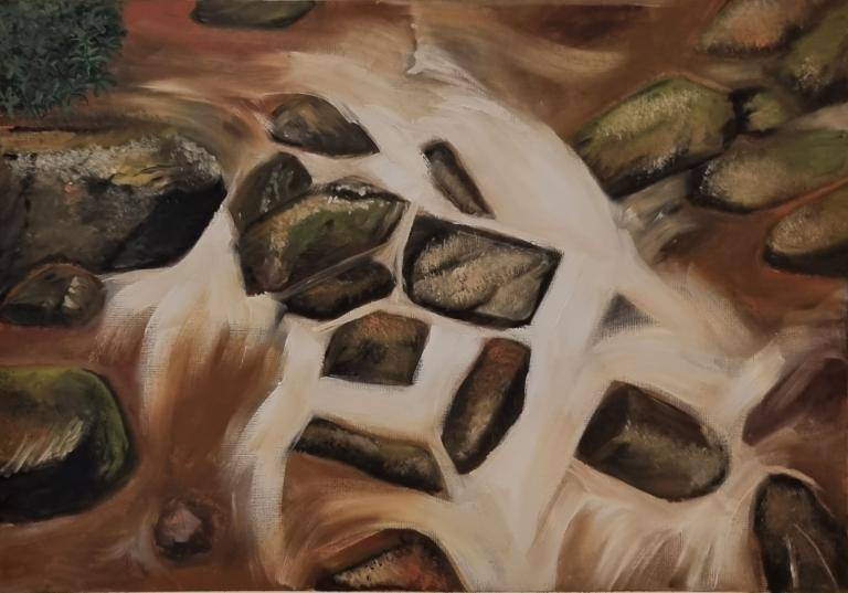 Water flowing through rocks image