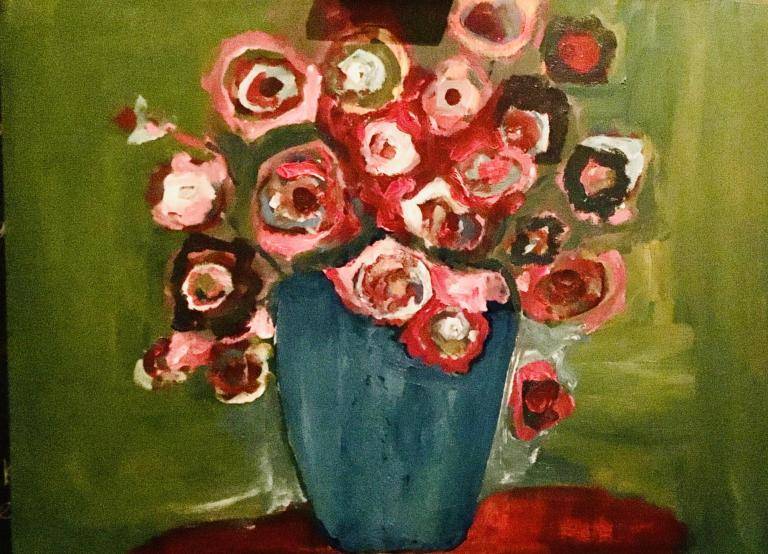 Red flowers in a blue vase image